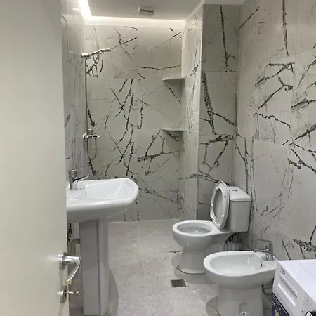 11 * Tirana